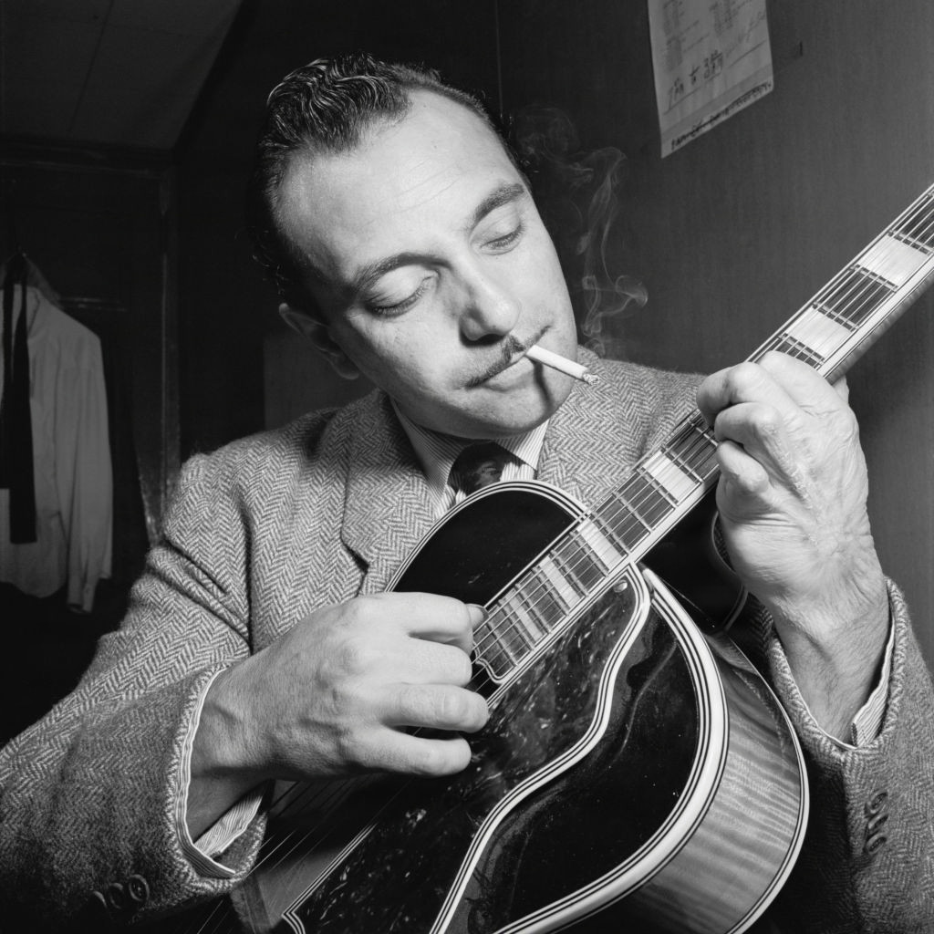 Django Reinhardt at the Aquarium jazz club in New York, NY by  William P. Gottlieb (Gottlieb_07301), CC0 Public Domain Dedication